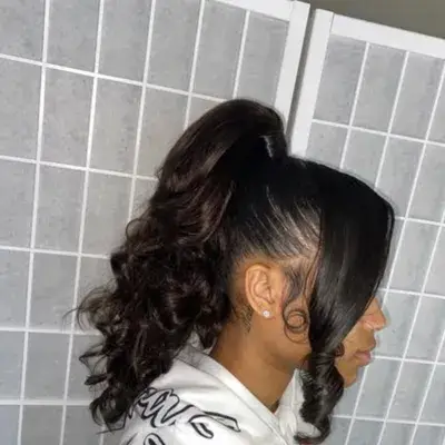 curly-ponytail-with-side-bangs